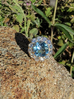 14k gold aquamarine & diamond estate halo ring