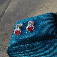 14k white gold ruby and diamond halo studs