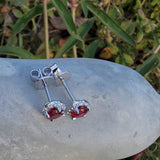 14k white gold ruby and diamond halo studs