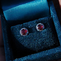 14k white gold ruby and diamond halo studs