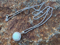 14k white gold opal & diamond halo necklace pendant