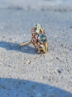 10k rose & yellow gold two tone leaf blue zircon ring