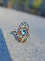 10k rose & yellow gold two tone leaf blue zircon ring