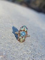10k rose & yellow gold two tone leaf blue zircon ring