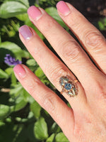 10k rose & yellow gold two tone leaf blue zircon ring