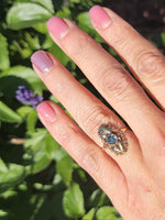 10k rose & yellow gold two tone leaf blue zircon ring