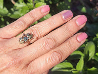 10k rose & yellow gold two tone leaf blue zircon ring