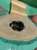 Platinum green tourmaline & diamond estate ring