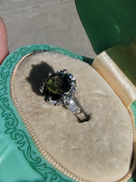Platinum green tourmaline & diamond estate ring