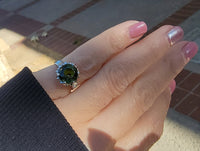 Platinum green tourmaline & diamond estate ring