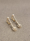 Platinum & 18k gold two tone diamond & pearl antique dangle "bow" earrings
