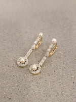 Platinum & 18k gold two tone diamond & pearl antique dangle "bow" earrings