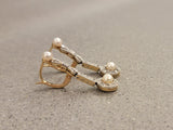Platinum & 18k gold two tone diamond & pearl antique dangle "bow" earrings
