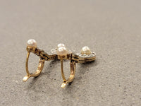 Platinum & 18k gold two tone diamond & pearl antique dangle "bow" earrings