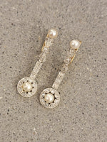 Platinum & 18k gold two tone diamond & pearl antique dangle "bow" earrings