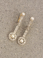 Platinum & 18k gold two tone diamond & pearl antique dangle "bow" earrings