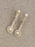 Platinum & 18k gold two tone diamond & pearl antique dangle "bow" earrings