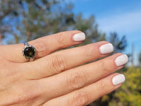 Platinum green tourmaline & diamond estate ring