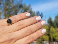 Platinum green tourmaline & diamond estate ring