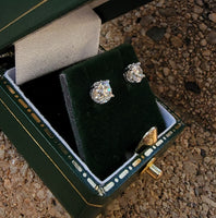 14k white gold European cut diamond scroll stud earrings - .76ct tw