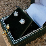 14k white gold European cut diamond scroll stud earrings - .76ct tw