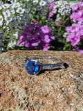 Platinum blue sapphire & baguette diamond estate ring