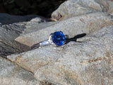 Platinum blue sapphire & baguette diamond estate ring