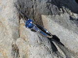 Platinum blue sapphire & baguette diamond estate ring