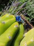 Platinum blue sapphire & baguette diamond estate ring