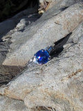 Platinum blue sapphire & baguette diamond estate ring