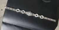 14k white gold c.1920's Art Deco filigree diamond & camphor bracelet