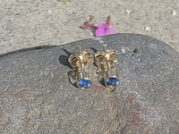 14k gold blue sapphire bezel stud earrings - .20ct tw