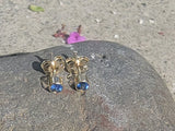 14k gold blue sapphire bezel stud earrings - .20ct tw